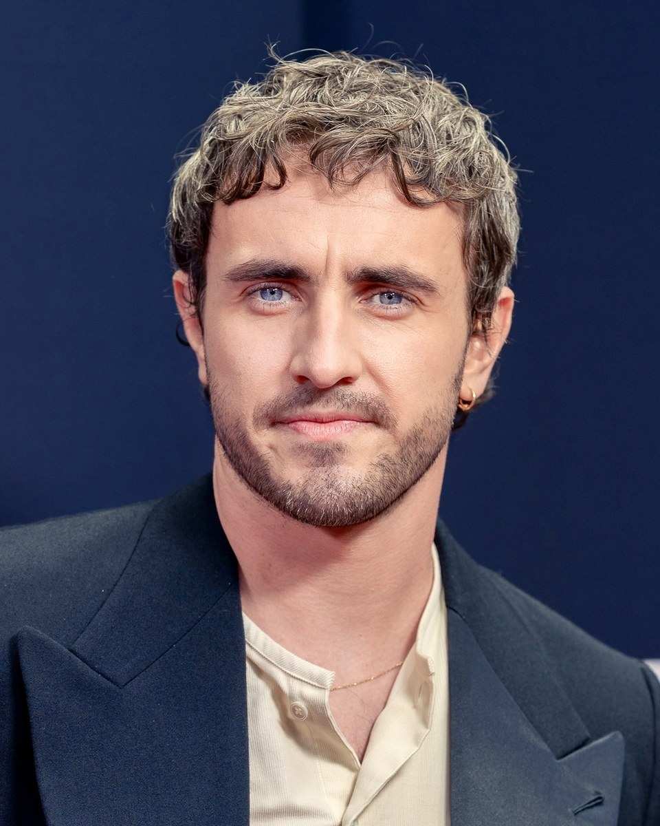 Paul Mescal in a navy blazer and cream shirt at a film festival